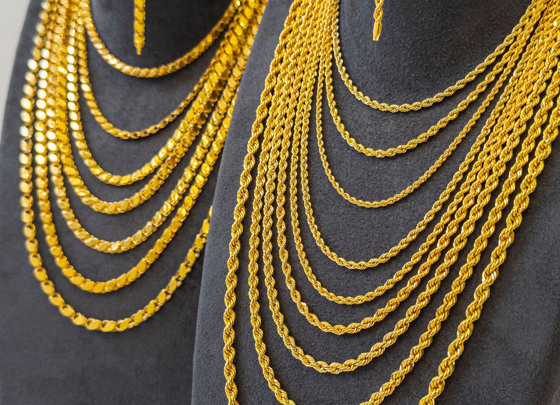 Close up of shiny gold chains and necklace jewelry jewellery gold Deep Shine Jewellers 