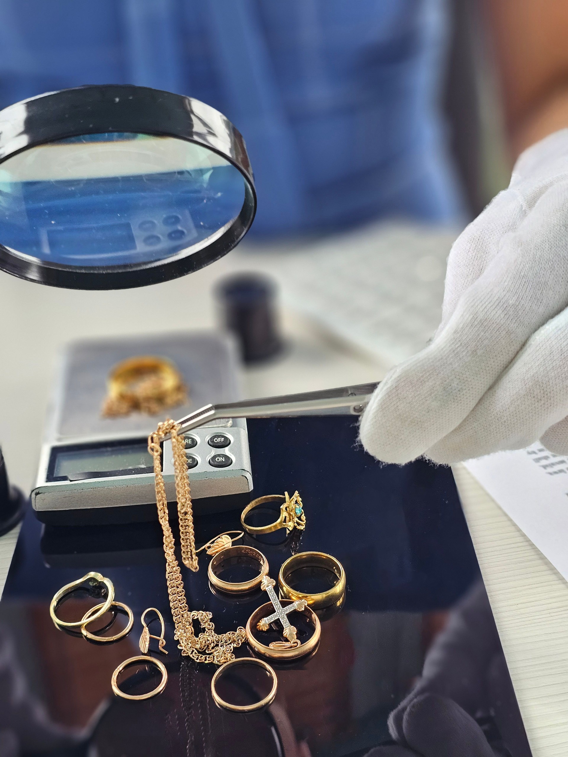 Jewelry appraisal process with magnifying glass and scale buy in trade upgrade silver gold 925 sterling silver diamonds mens womens kings queens exclusive by Deep Shine Jewellers jewellery Your Time To Shine DSJ